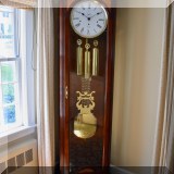 D01. Howard Miller “Mansfield” grandfather clock. Model 610-686. 80”h 24”w x 14”d 